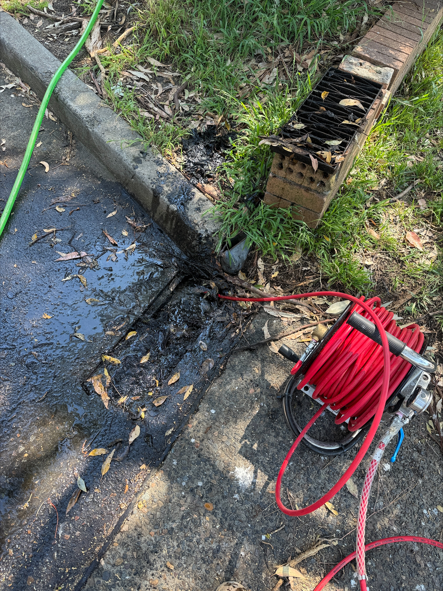 High pressure drain jetting service in Sydney clearing a blocked sewer or stormwater drain