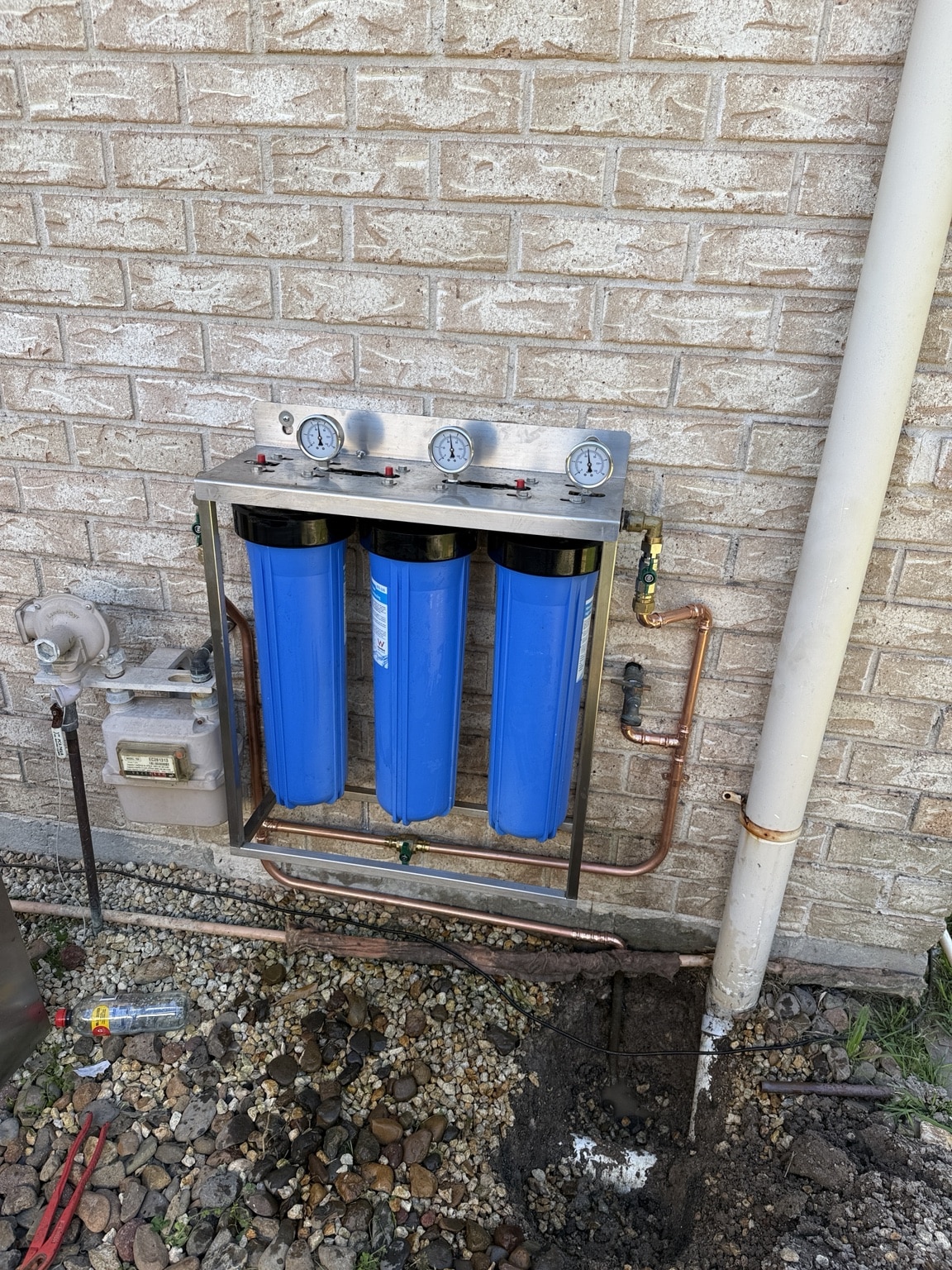 Whole house water filtration system installed by JNG Plumbing Group in Revesby